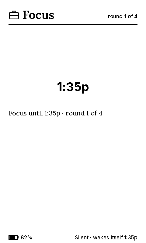 The X4 Focus screen: a large time of 1:35 p.m., the line Focus until 1:35p, round 1 of 4, and the footer showing battery and that the screen is silent and wakes itself.